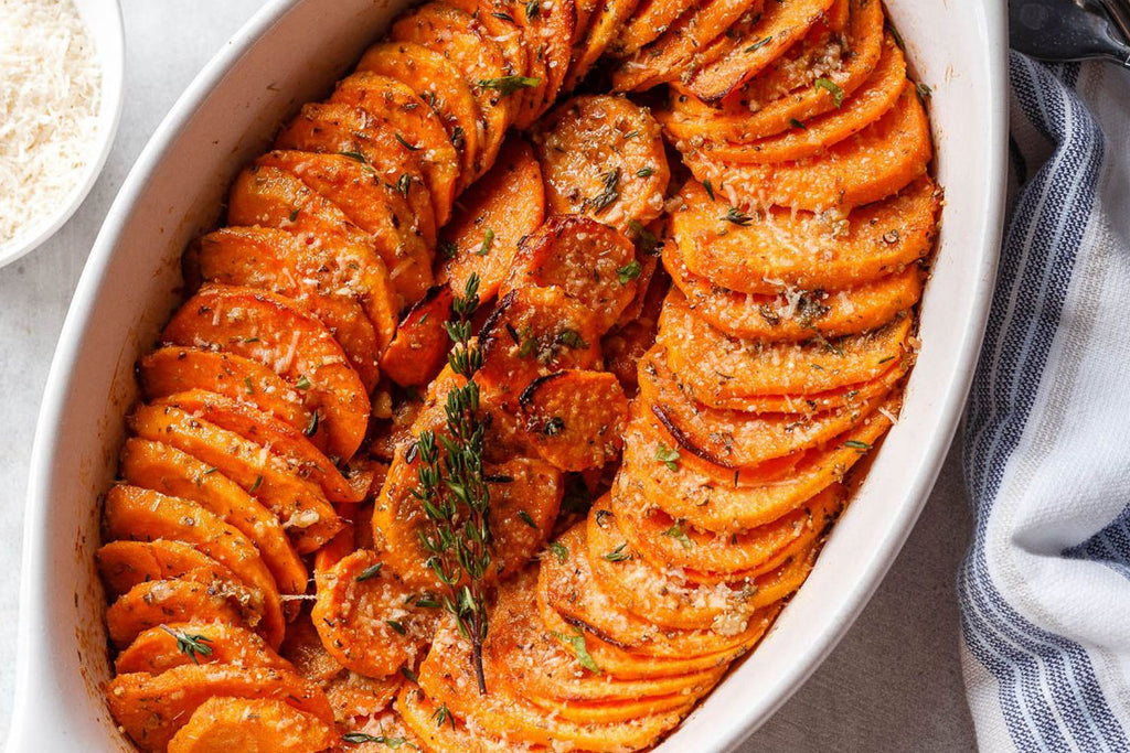 ROAST SWEET POTATOES WITH MAPLE SYRUP, ORANGE AND SPICES